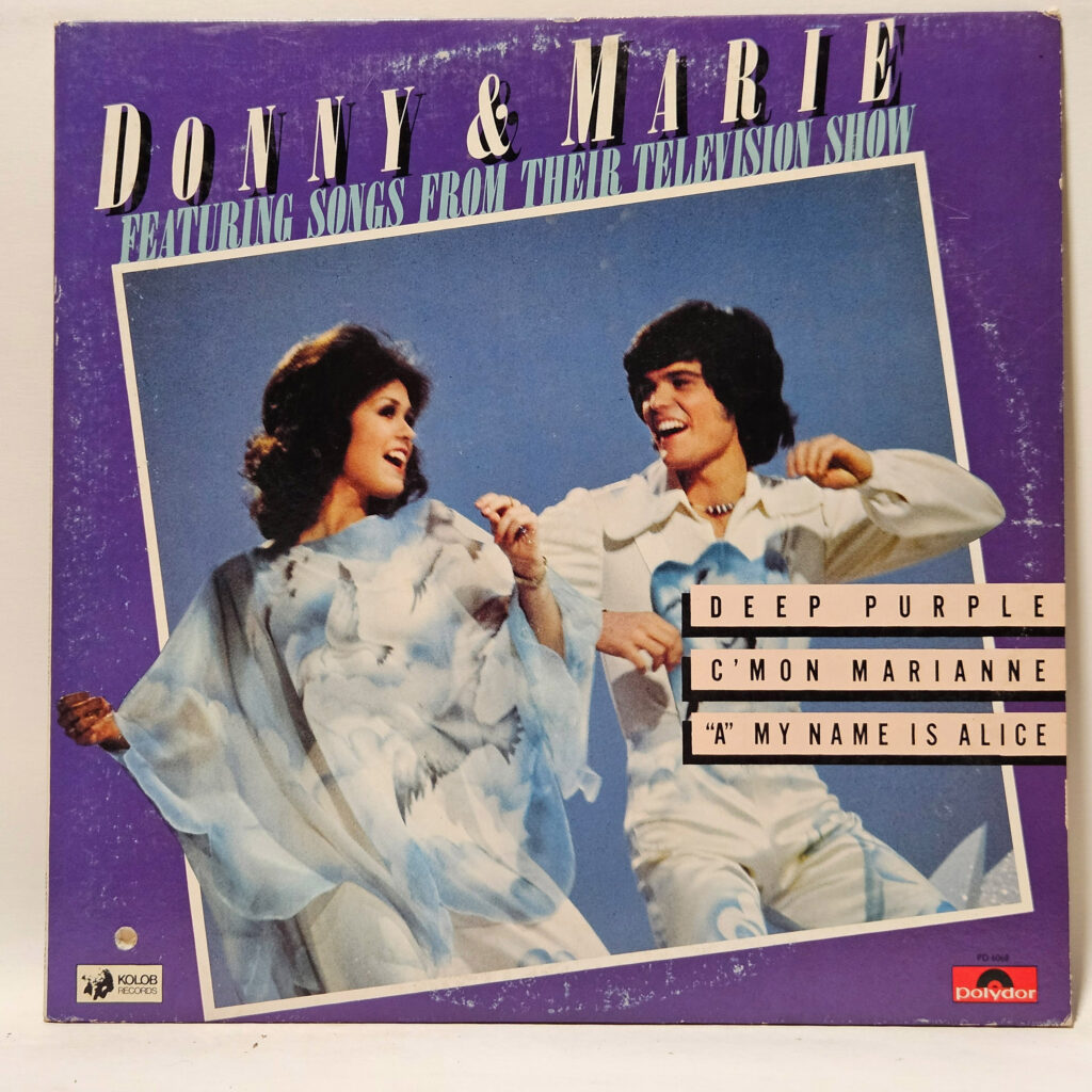 Donny & Marie Osmond Donny & Marie Featuring Songs From Their Television Show 147073989308